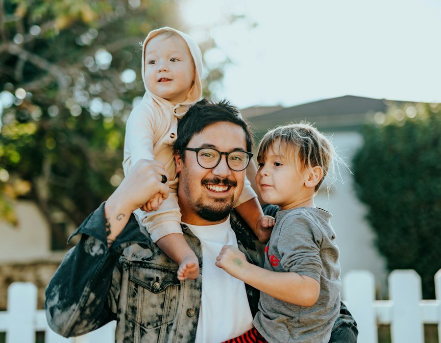 A father spending time with his two young children